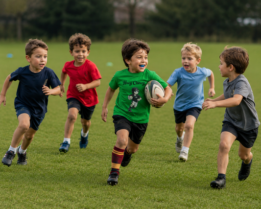 Boy playing rugby wearing Huey Chewy green rugby t-shirt